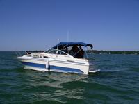 Boat patrolling Mullett Lake